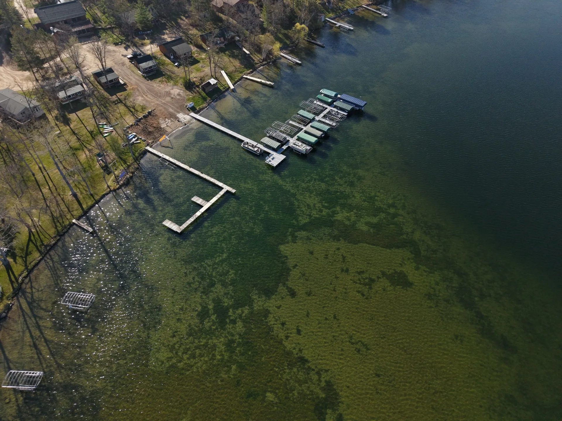 Aerial view of Morning Star Resort on Lake Andrusia, Minnesota, with shallow lake bottom visible through clear water.